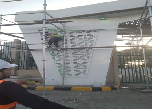 McNile crew installing an aluminum cladding facade panel