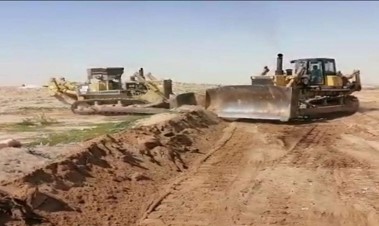 Bulldozers on earthworks and grading